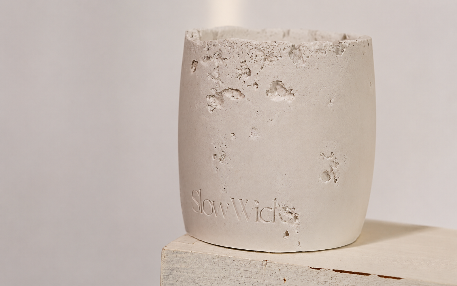 Dyed plaster scent object with textured Nordic-style plaster finish