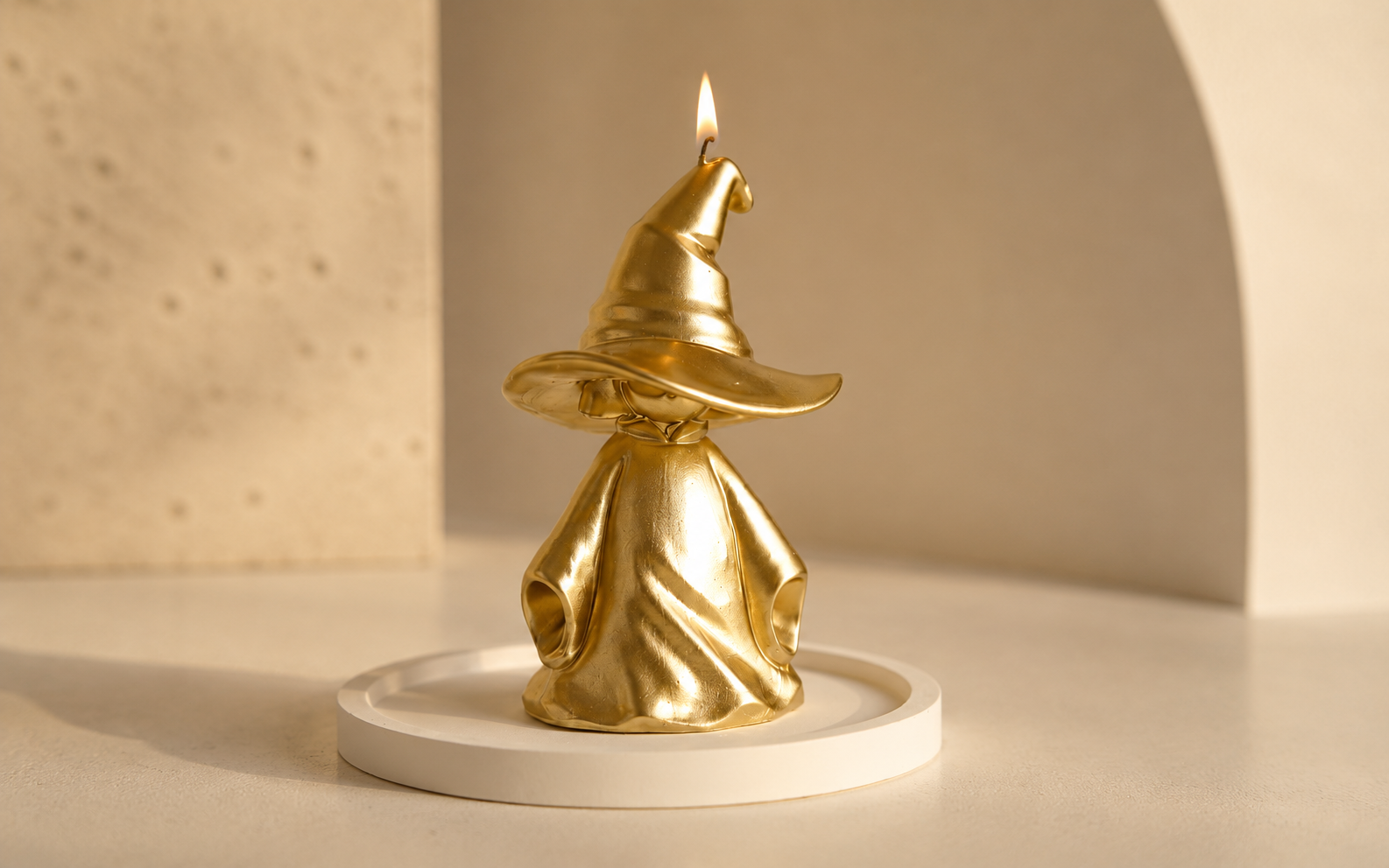 Sculptural candle development with custom wax form and metallic coating finish