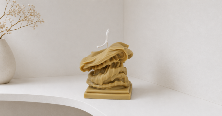 Plant-based sculptural candle with a smooth, premium surface finish